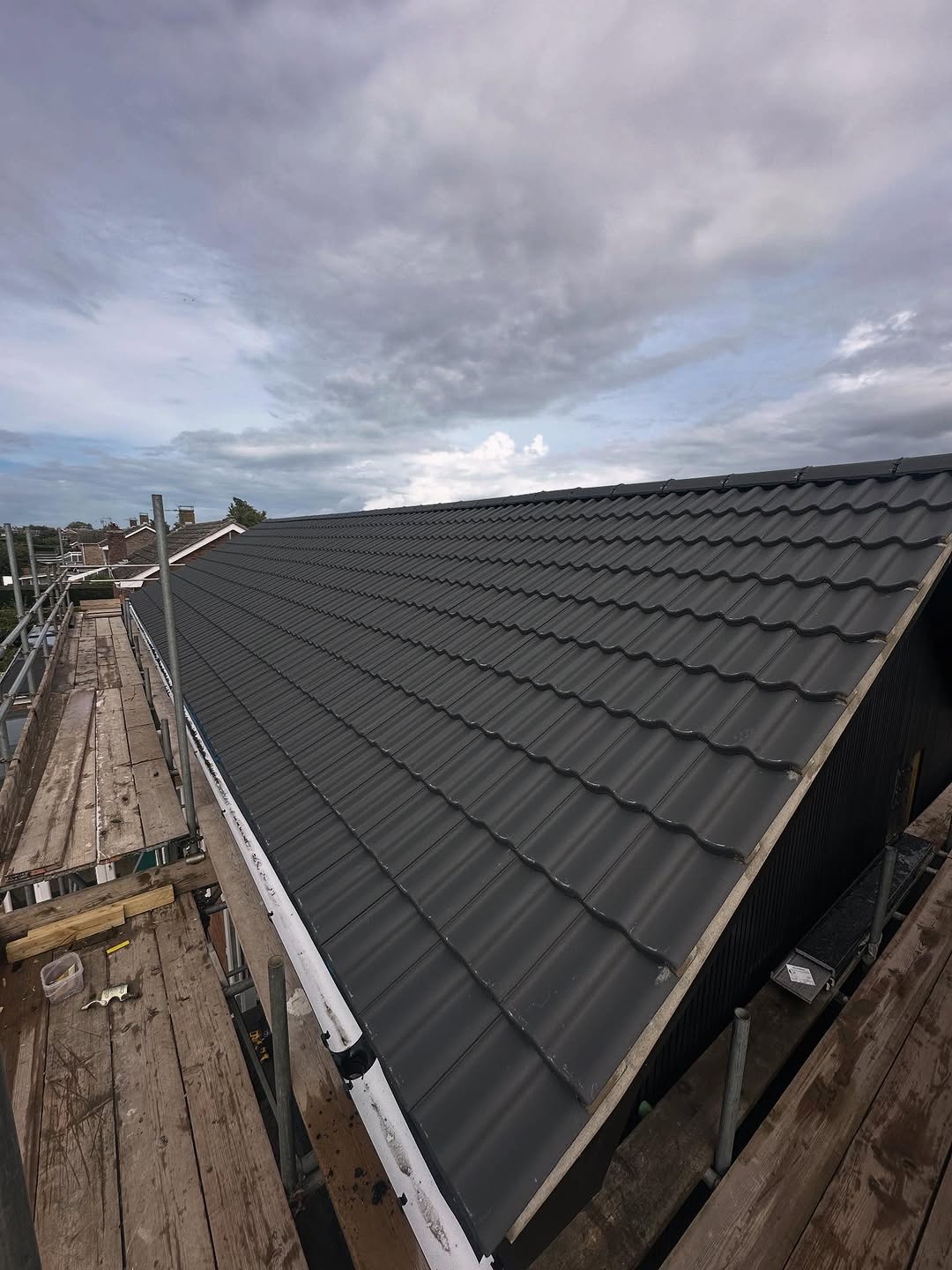 Re - Roof completed in Oulton Broad using new double crest anthracite grey tiles 🔥🧨